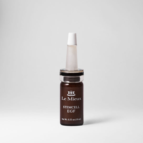 Le Mieux StemCell EGF serum in a glass ampoule, showcasing the skincare product designed to promote skin regeneration and vitality.