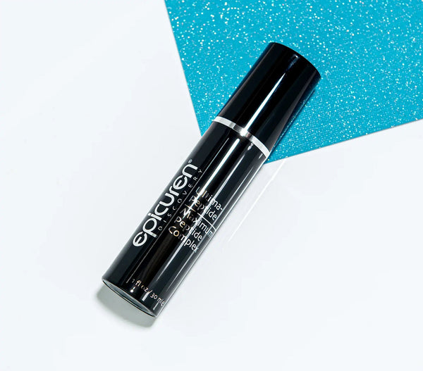 Epicuren Discovery Ultima-Peptide Maximum Peptide Complex anti-aging serum in a lifestyle setting with elegant packaging.