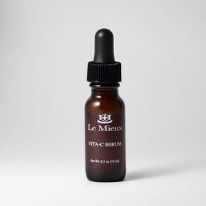 Le Mieux Vita-C Serum in a 0.5 oz bottle, featuring a clear serum with a pump dispenser, designed for brightening and nourishing skin.