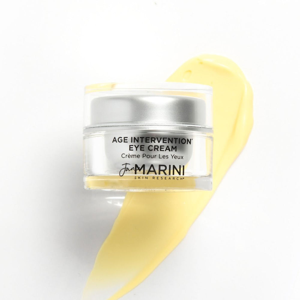 Jan Marini Age Intervention Eye Cream in a jar, targeting dark spots with a luxurious texture and sleek packaging.