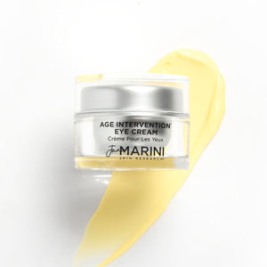 Jan Marini Age Intervention Eye Cream jar with dark spots treatment, showcasing the product's front label and design.