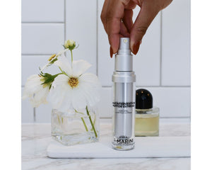 Jan Marini Age Intervention Peptide Extreme for reducing dark spots, featuring a sleek bottle design.