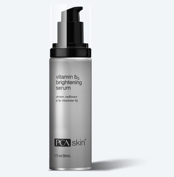 PCA Skin Vitamin B3 Eye Brightening Serum in a dropper bottle, designed for eyes, neck, and lips, on a soft surface.