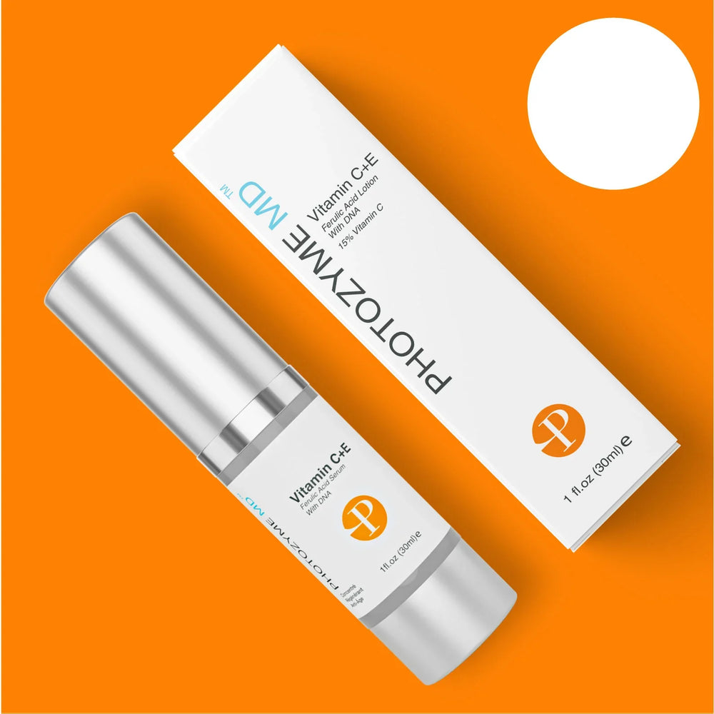 Photozyme Vitamin C+E + Ferulic Acid Lotion in a sleek bottle, showcasing its rich serum texture for facial care.