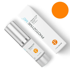 Photozyme Vitamin C+E + Ferulic Acid Facial Serum in a clear bottle with a dropper on a light background.