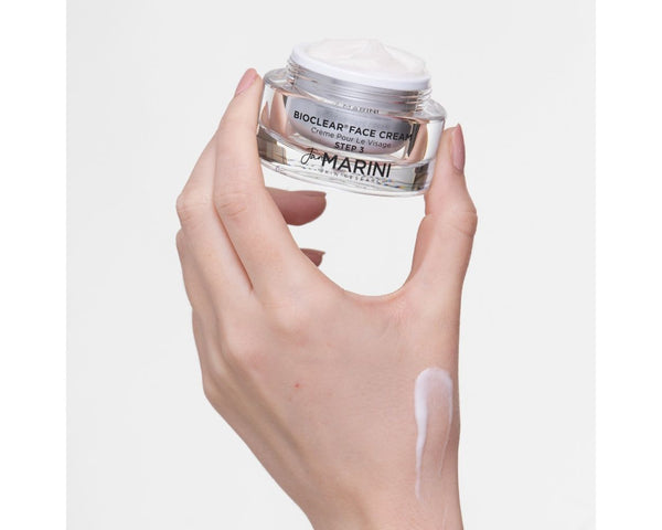 Jan Marini Bioclear Cream in a jar, designed to reduce dark spots and improve skin tone.