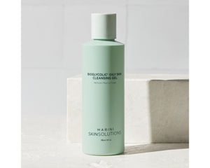 Jan Marini Bioglycolic Oily Skin Cleansing Gel in a lifestyle setting, showcasing its packaging and consistency.