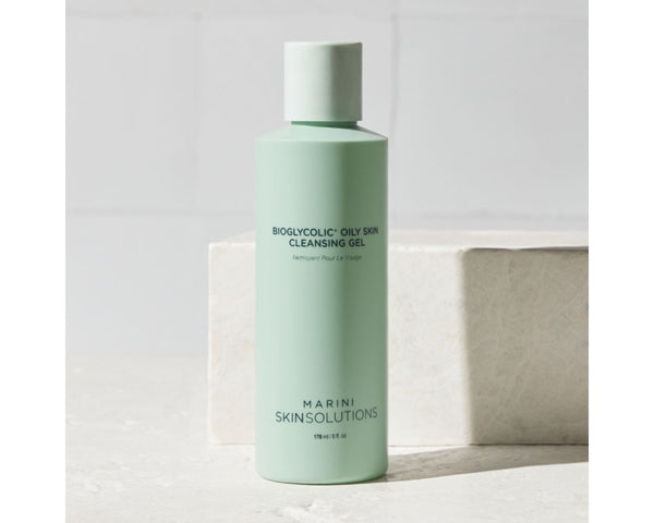Jan Marini Bioglycolic Oily Skin Cleansing Gel in a lifestyle setting, showcasing its packaging and consistency.