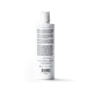 Jan Marini C-ESTA Cleansing Gel for dark spots in a clear bottle with a pump top on a neutral background.