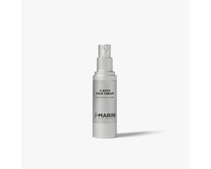 Jan Marini C-ESTA Face Cream for dark spots in a sleek jar with a label showcasing the product name and brand.