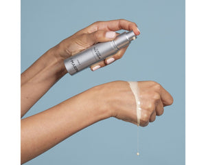 Jan Marini C-ESTA Face Serum in a sleek bottle, designed to target dark spots and improve skin tone.