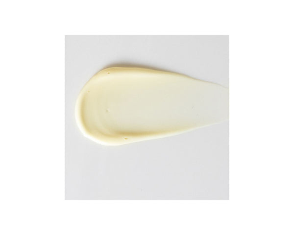 Jan Marini Marini CelluliTX body scrub texture spread on a surface, showcasing its creamy consistency and exfoliating properties.