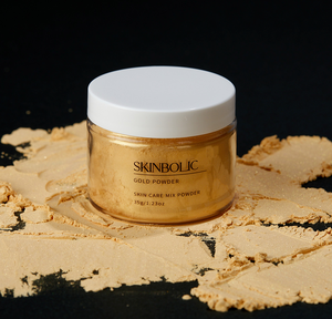 Skinbolic Gold Powder Mask 35g in a clear jar, showcasing a shimmering gold powder for moisturizing skin.