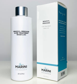 Jan Marini Benzoyl Peroxide 2.5% Wash in a white bottle with a pump, designed for acne treatment.