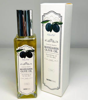 Skinbolic Mandarin Olive Oil SPF in a 100ml bottle with a vibrant mandarin design, showcasing its natural ingredients.
