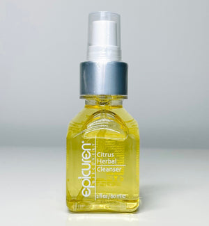 Epicuren Discovery Citrus Herbal Cleanser bottle with a vibrant citrus design, surrounded by fresh herbs.