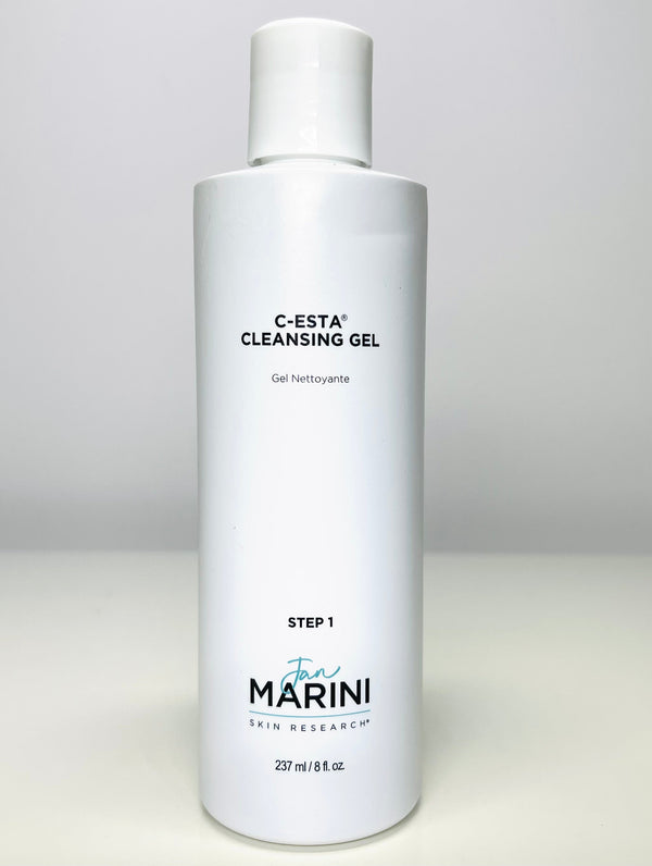 Jan Marini C-ESTA Cleansing Gel in a clear bottle, designed to help reduce dark spots on the skin.