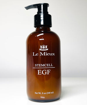 Le Mieux Youth in a Bottle Stemcell EGF Deluxe serum in a sleek bottle, showcasing a clear liquid inside.