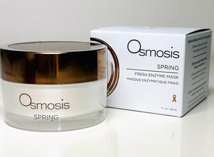 Osmosis Beauty Spring Fresh Enzyme Mask in a jar with a creamy texture, surrounded by fresh spring flowers.