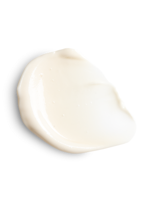 Jan Marini Marini Luminate Face Lotion in a creamy texture smear on a clean surface, showcasing its moisturizing properties.