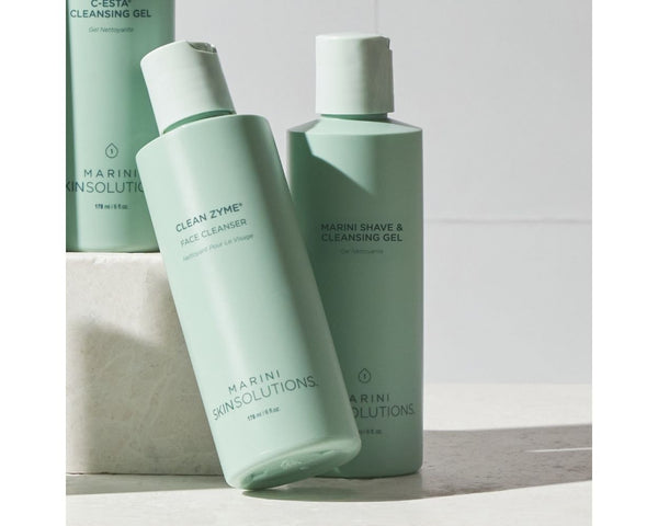 Jan Marini Clean Zyme cleanser in a bottle with a pump, designed for gentle skin exfoliation and cleansing.