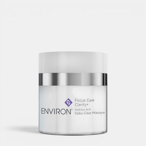 Environ Sebu-Clear Masque in a jar, a skincare mask and exfoliator for acne-prone skin, with a white and green packaging design.