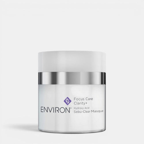 Environ Sebu-Clear Masque in a jar, a skincare mask and exfoliator for acne-prone skin, with a white and green packaging design.