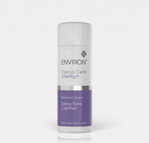 Environ Botanical Infused Sebu-Tone Clarifier toner bottle showing natural botanical ingredients and clear liquid in a sleek container.