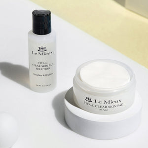 Le Mieux Vita-C Clear Skin Pad exfoliant showing textured pad with vitamin C infusion for brightening and clear skin.